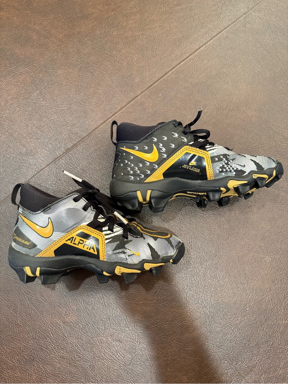 Nike Kids' Alpha Football Cleats in Black & Gold size 12c